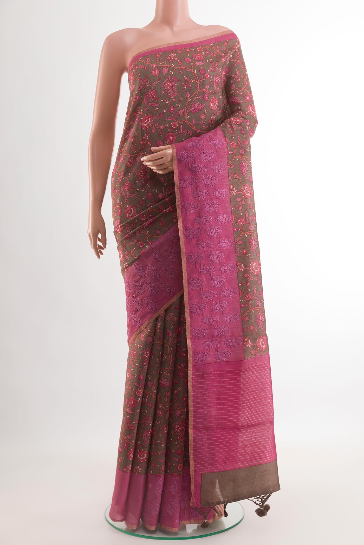 Dark Beige Tussar Silk Saree with Printed design on the body and Embroidery Border.  displayed on a mannequin