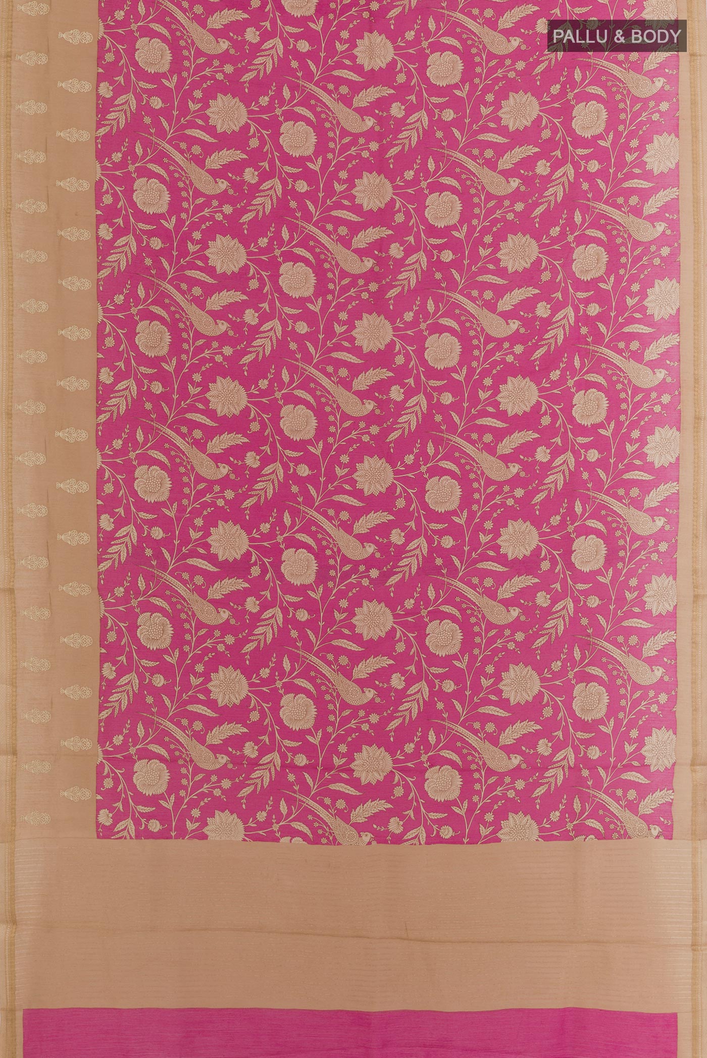 Flat view of Rani Pink Tussar Silk Saree with Printed design on the body and Zari Border. 