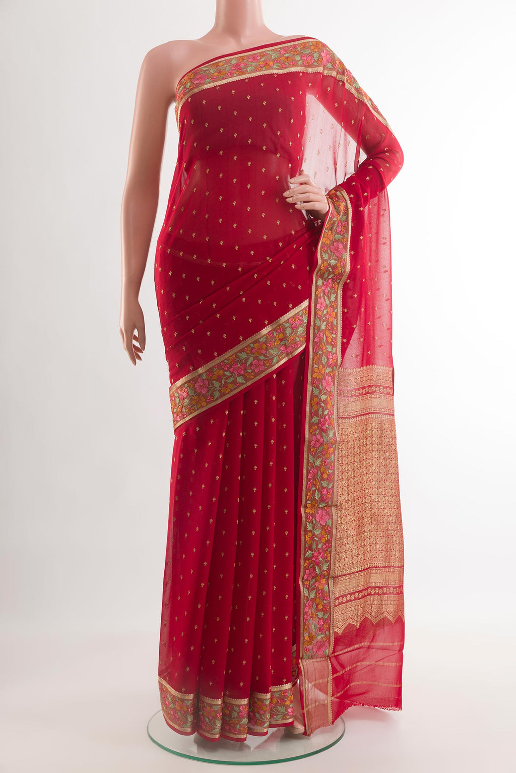 Red Mysore Chiffon Saree with Zari Butta on the body and Zari Border.  displayed on a mannequin