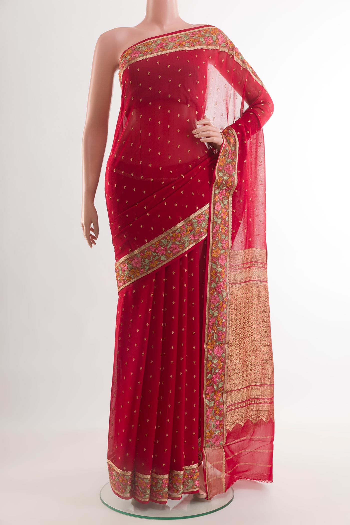 Red Mysore Chiffon Saree with Zari Butta on the body and Zari Border.  displayed on a mannequin