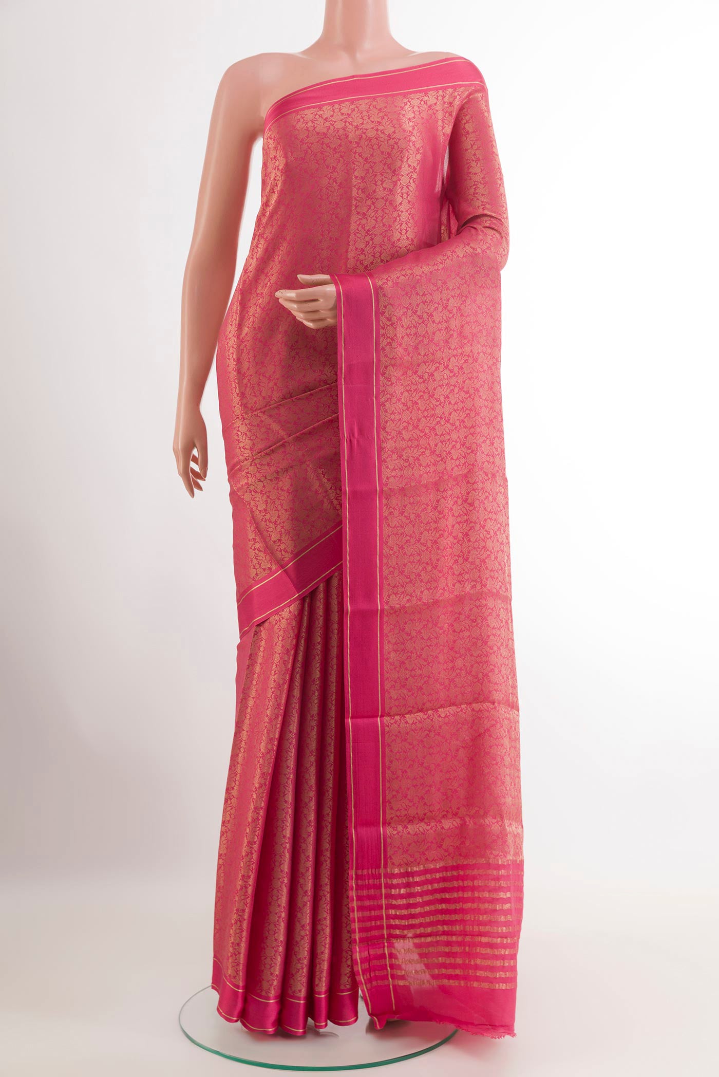Pink Mysore Crepe Saree with Zari Brocade on the body and Zari Border.  displayed on a mannequin