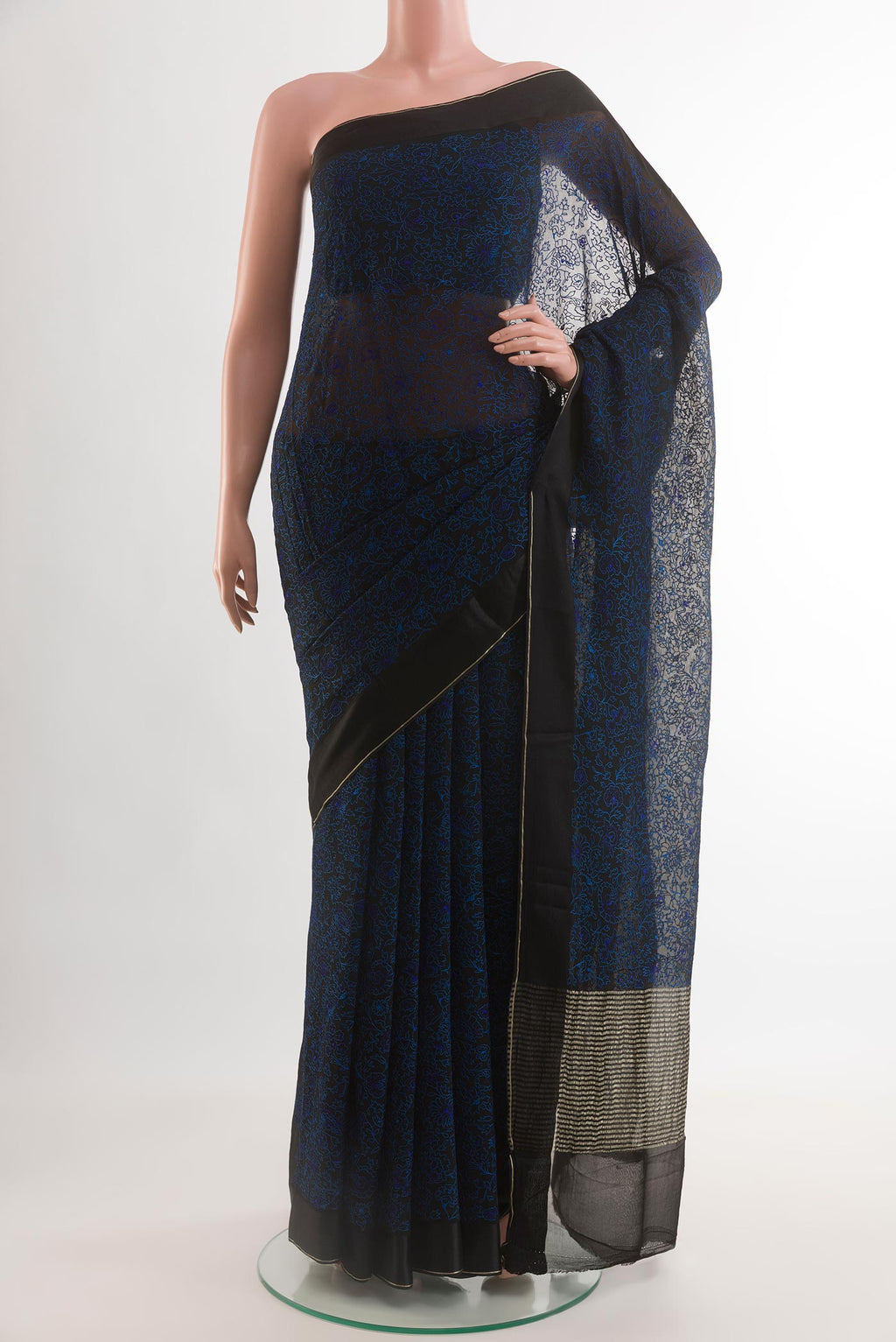 Navy Blue Mysore Chiffon Saree with Embroidery on the body and Thread Border.  displayed on a mannequin