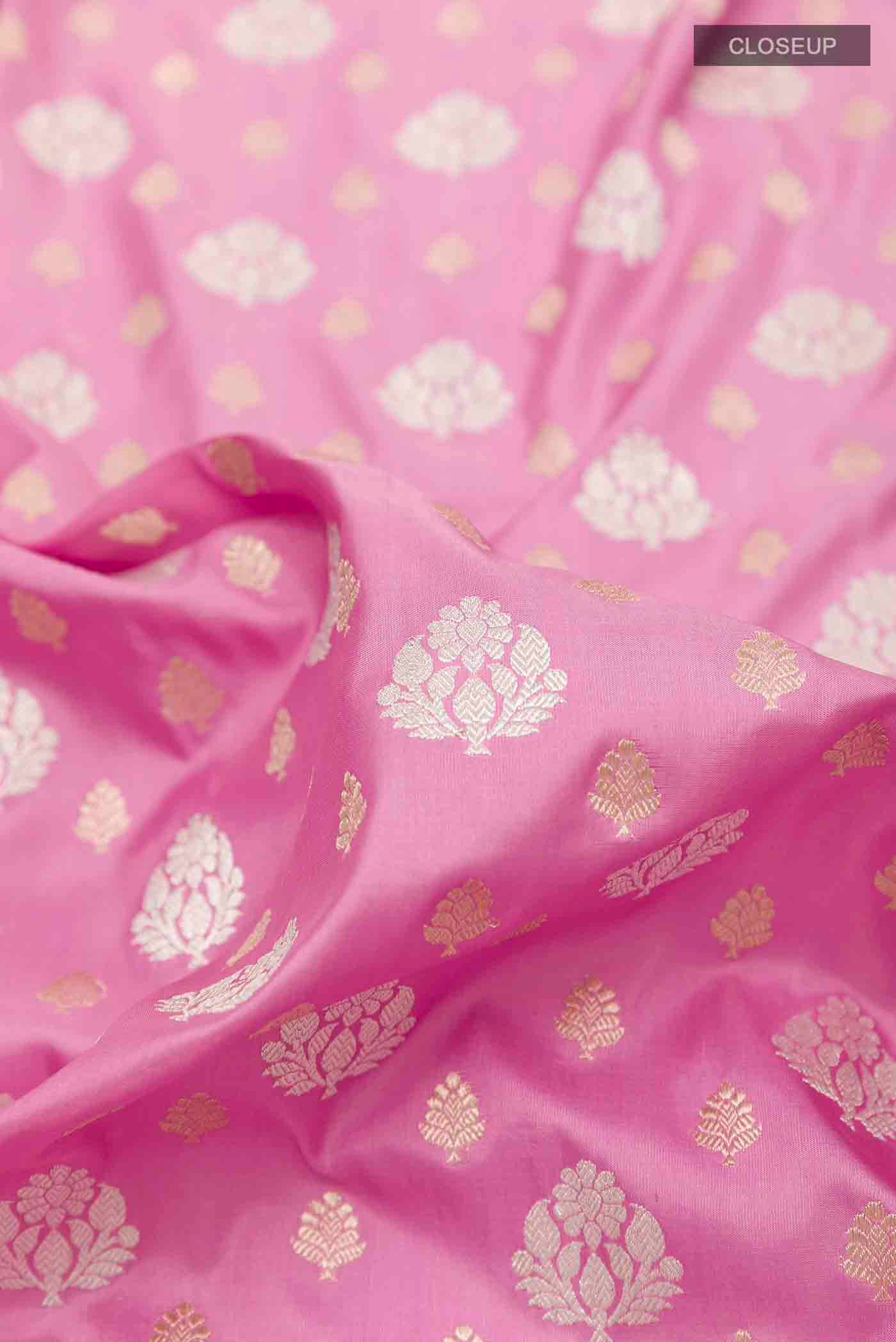 Close up of Pink Banarasi Silk Saree with Zari Brocade on the body and Zari Border displaying folds