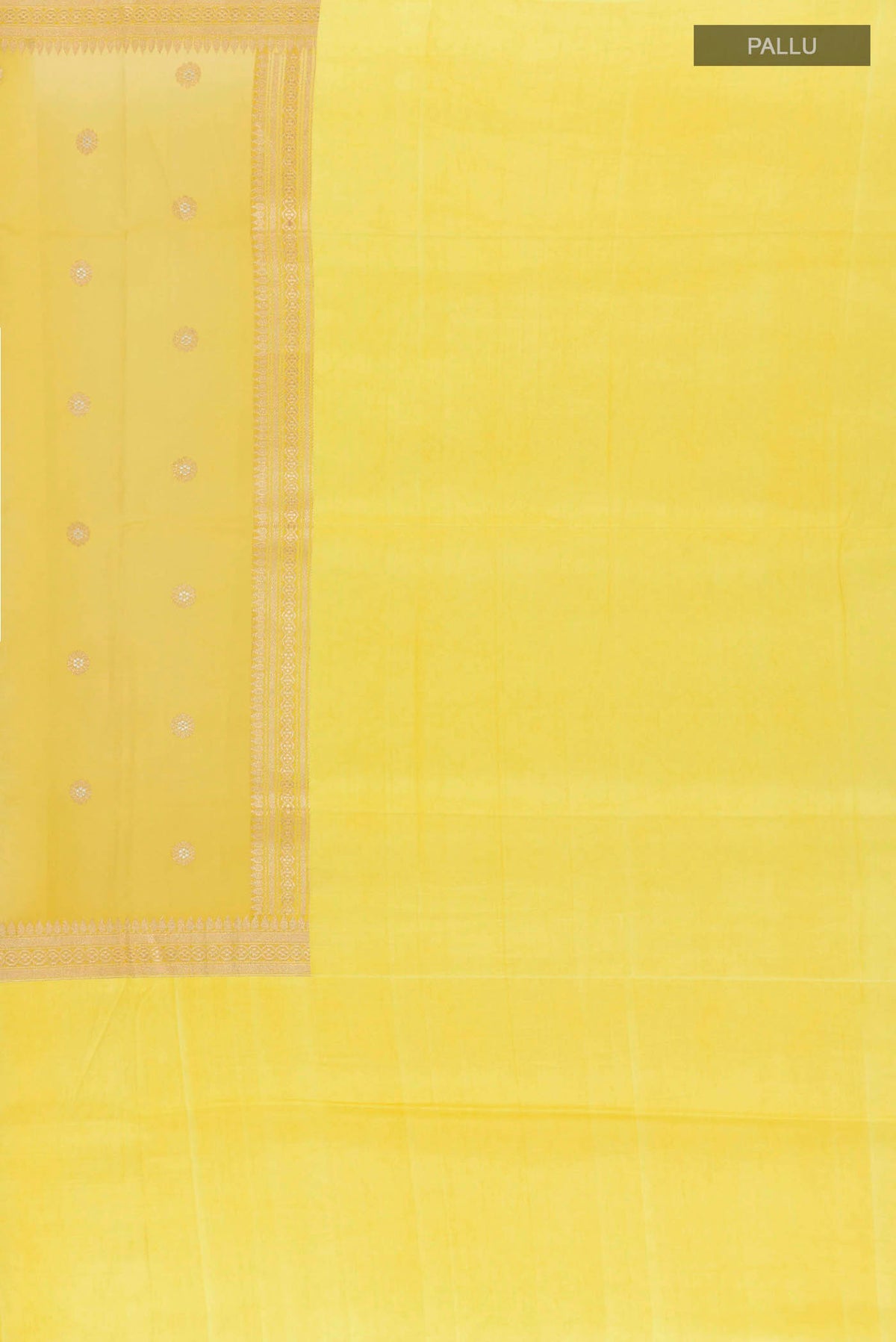 Close up image of the pallu of Yellow Banarasi Kora Silk Saree with Zari Butta on the body and Zari Border