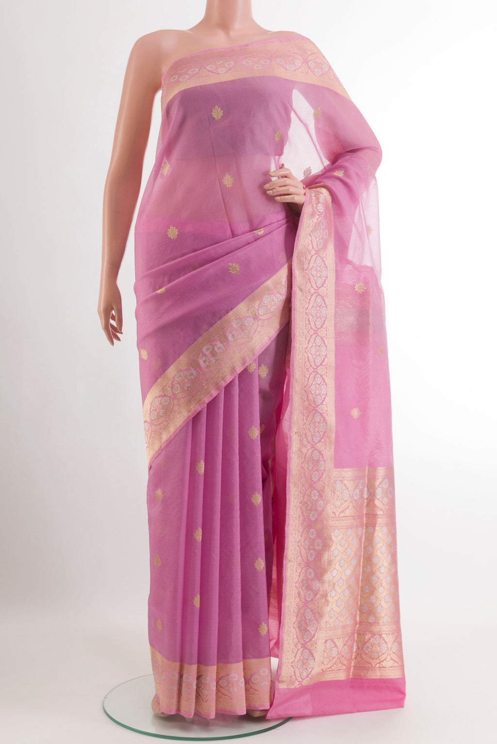 Lavender Banarasi Kora Silk Saree with Zari Butta on the body and Zari Border.  displayed on a mannequin