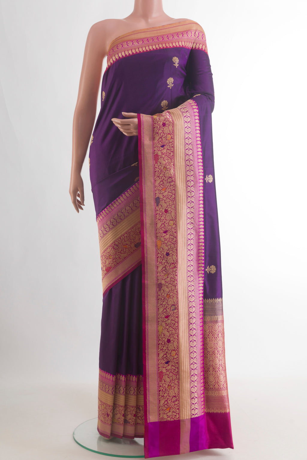 Pure Silk Purple Banarasi Saree with Zari Butta on the body and Zari Border.  displayed on a mannequin