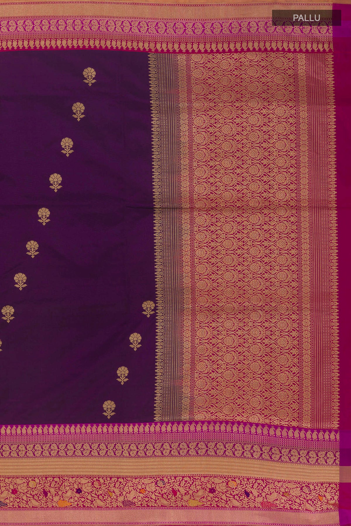 Close up image of the pallu of Pure Silk Purple Banarasi Saree with Zari Butta on the body and Zari Border. 