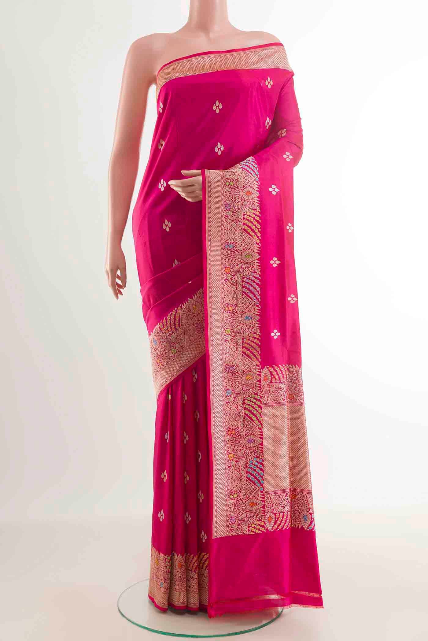 Pink Banarasi Silk Saree with Zari Butta on the body and Zari Border displayed on a mannequin