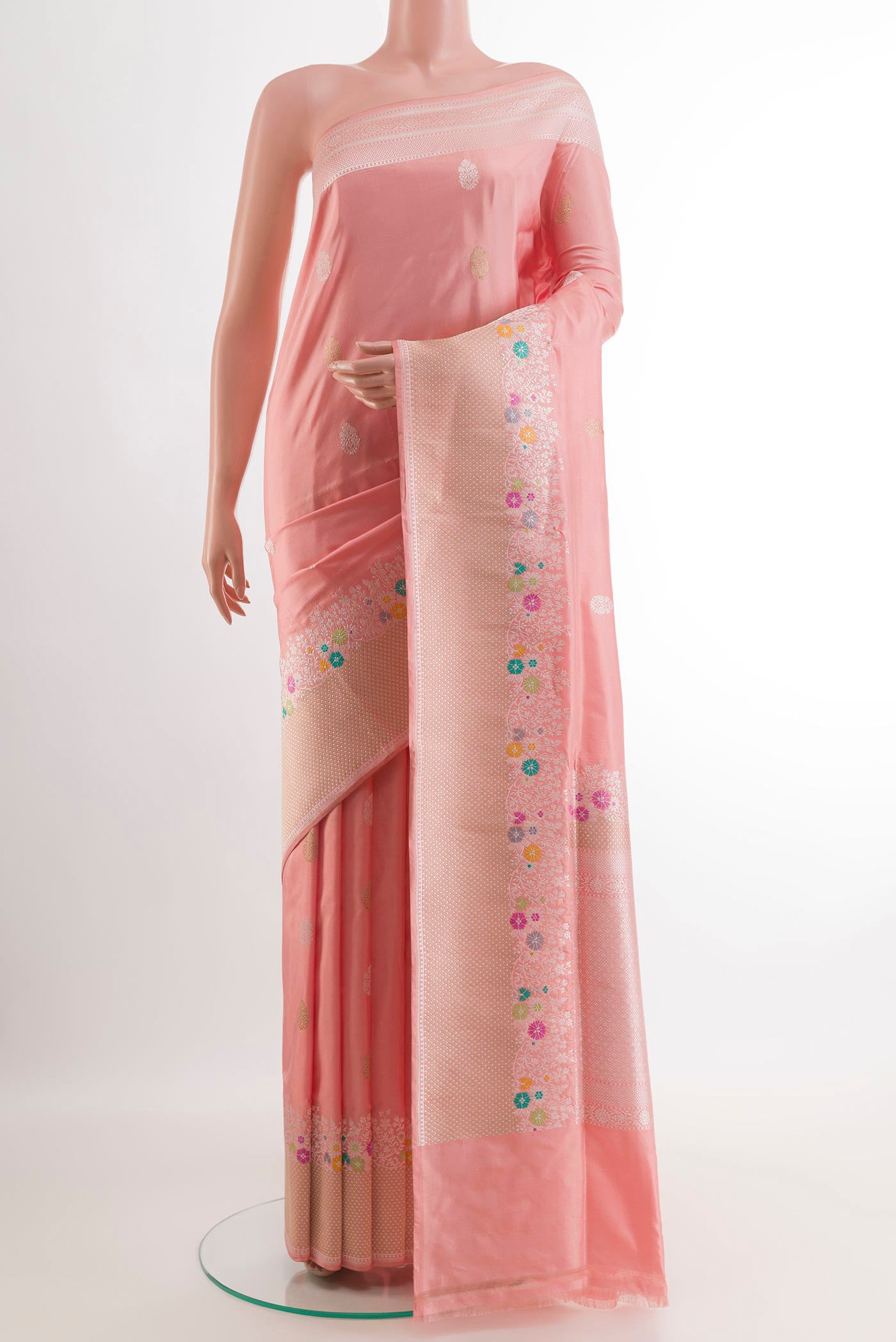 Rose pink Banarasi Silk Saree with Zari Butta on the body and Zari Border.  displayed on a mannequin