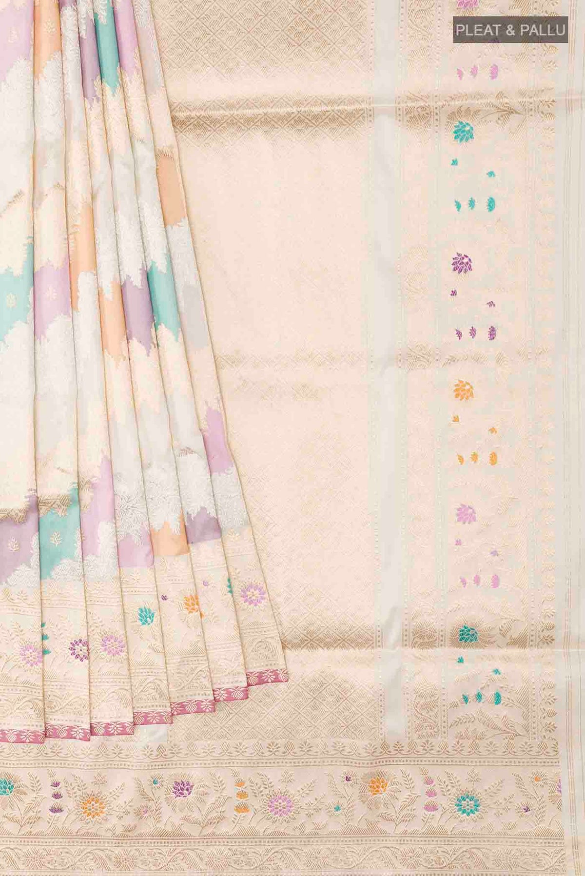 Pleats and pallu of Off White Banarasi Silk Saree with Zari Brocade on the body and Zari Border