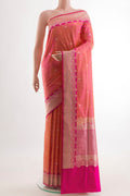 Multi Color Banarasi Silk Saree with Checked design on the body and Zari Border.  displayed on a mannequin