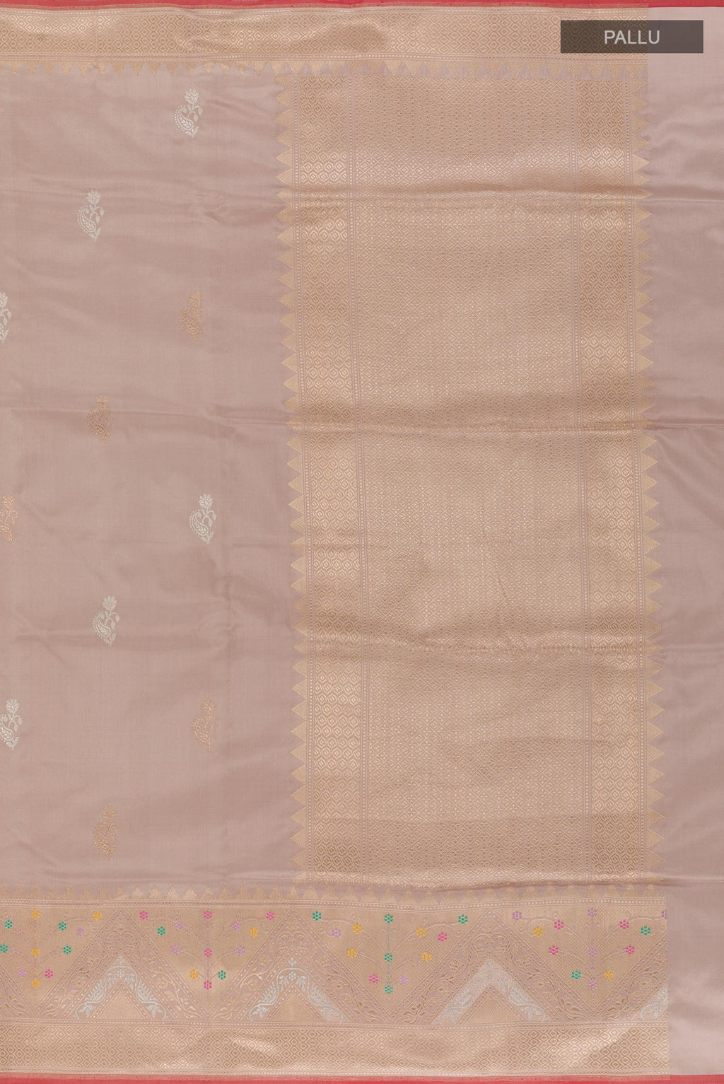 Close up image of the pallu of Beige Banarasi Silk Saree with Zari Butta on the body and Zari Border. 