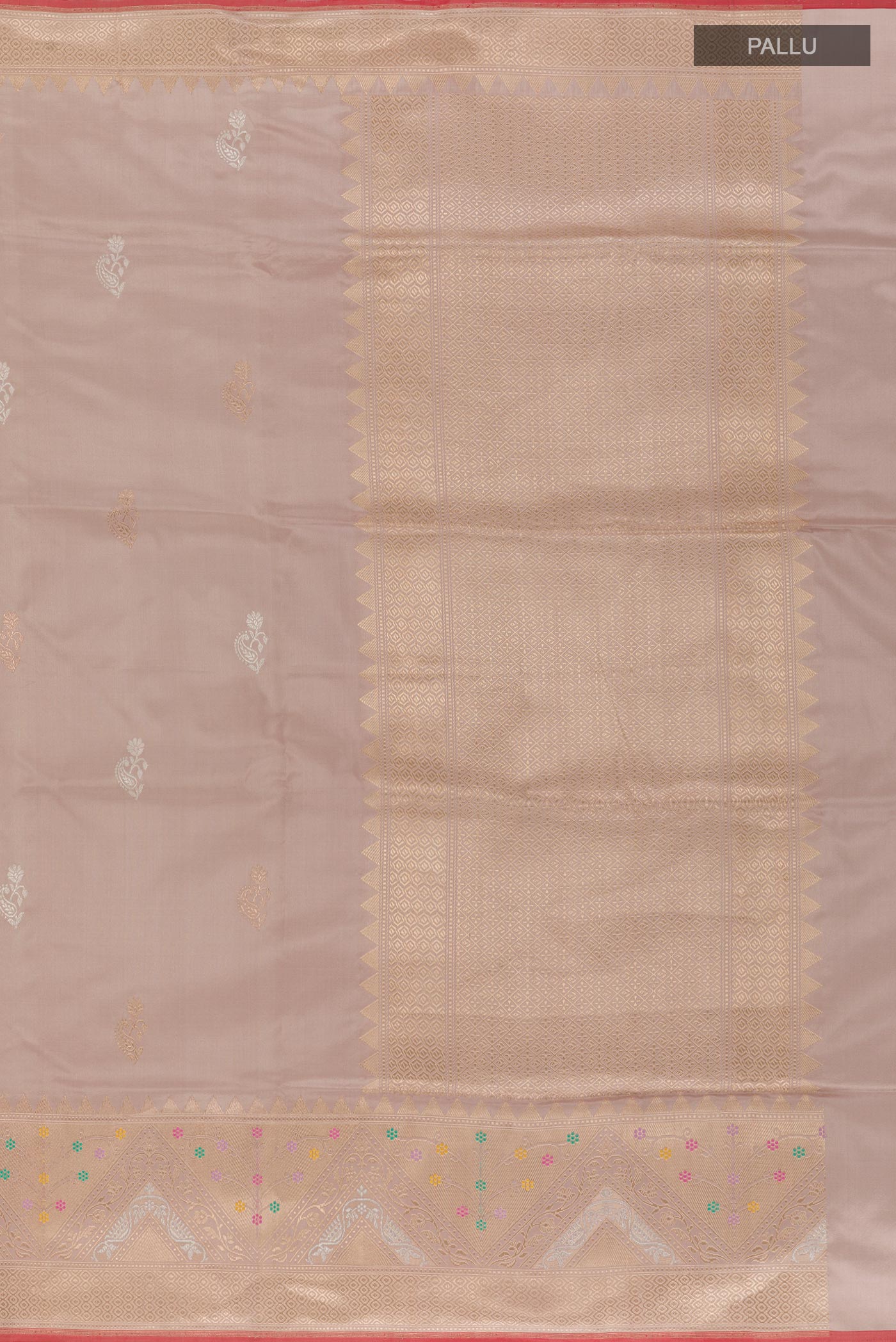 Close up image of the pallu of Beige Banarasi Silk Saree with Zari Butta on the body and Zari Border. 