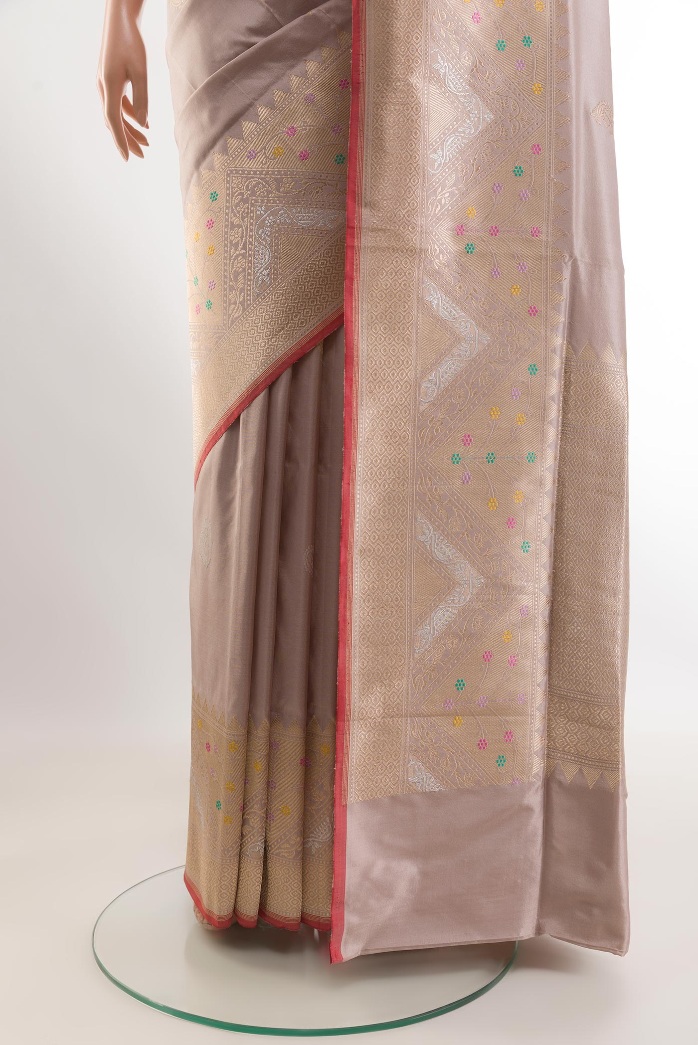 Pleats and pallu of Beige Banarasi Silk Saree with Zari Butta on the body and Zari Border. 