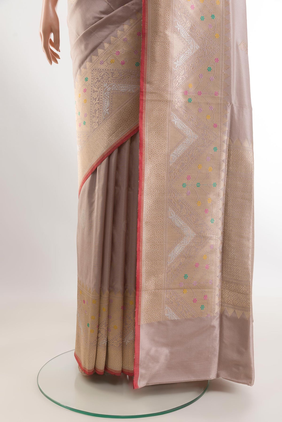 Pleats and pallu of Beige Banarasi Silk Saree with Zari Butta on the body and Zari Border. 