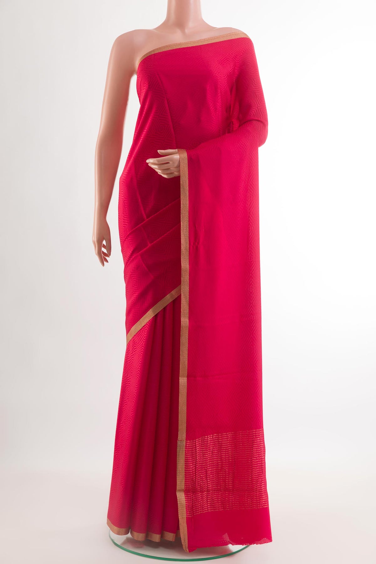 Pink Mysore Crepe Saree with Jacquard design on the body and Zari Border.  displayed on a mannequin