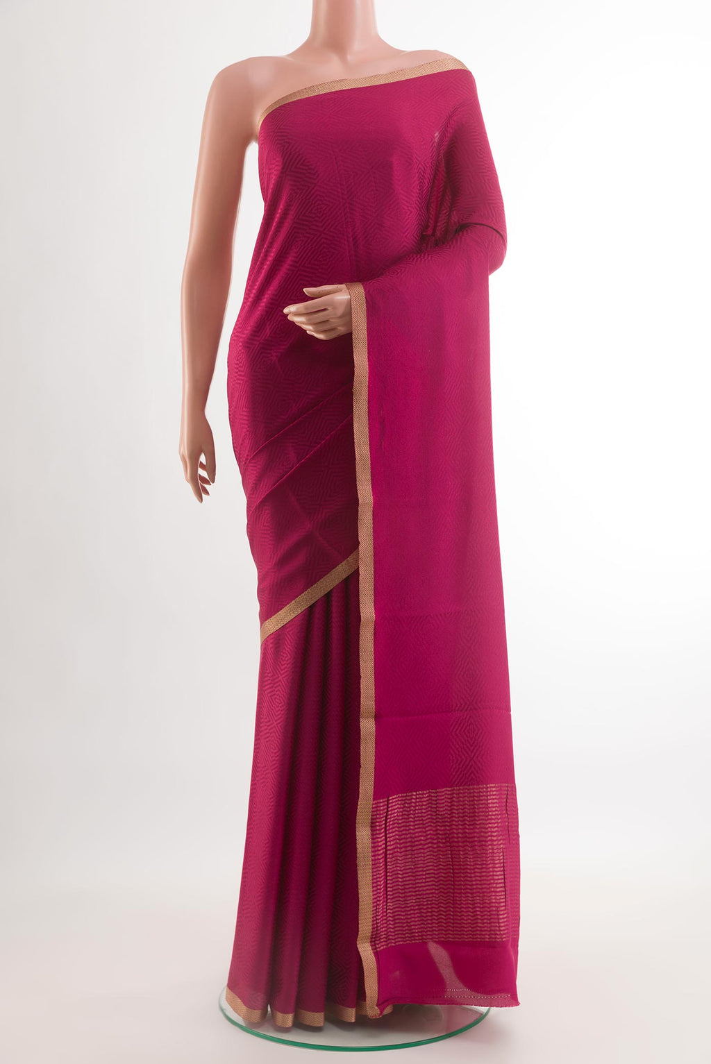 Dark Pink Mysore Crepe Saree with Jacquard design on the body and Zari Border.  displayed on a mannequin