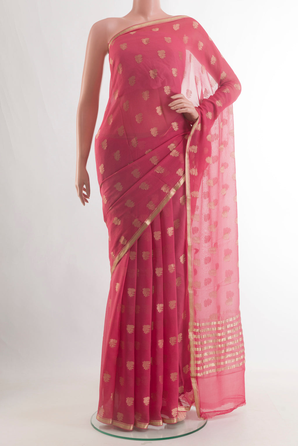 Pink Mysore Chiffon Saree with Zari Butta on the body and Zari Border.  displayed on a mannequin