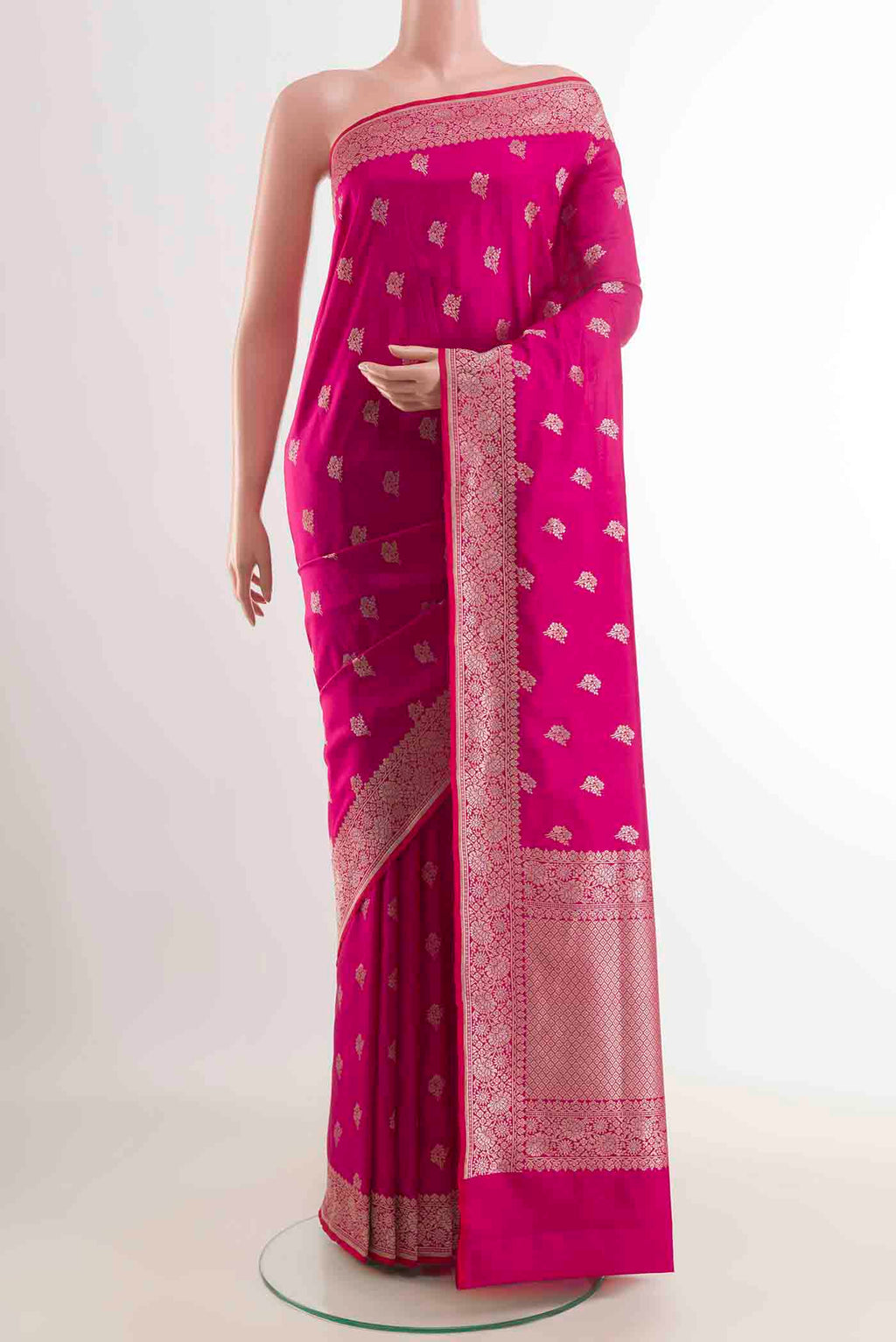 Pink Banarasi Silk Saree with Zari Butta on the body and Zari Border displayed on a mannequin