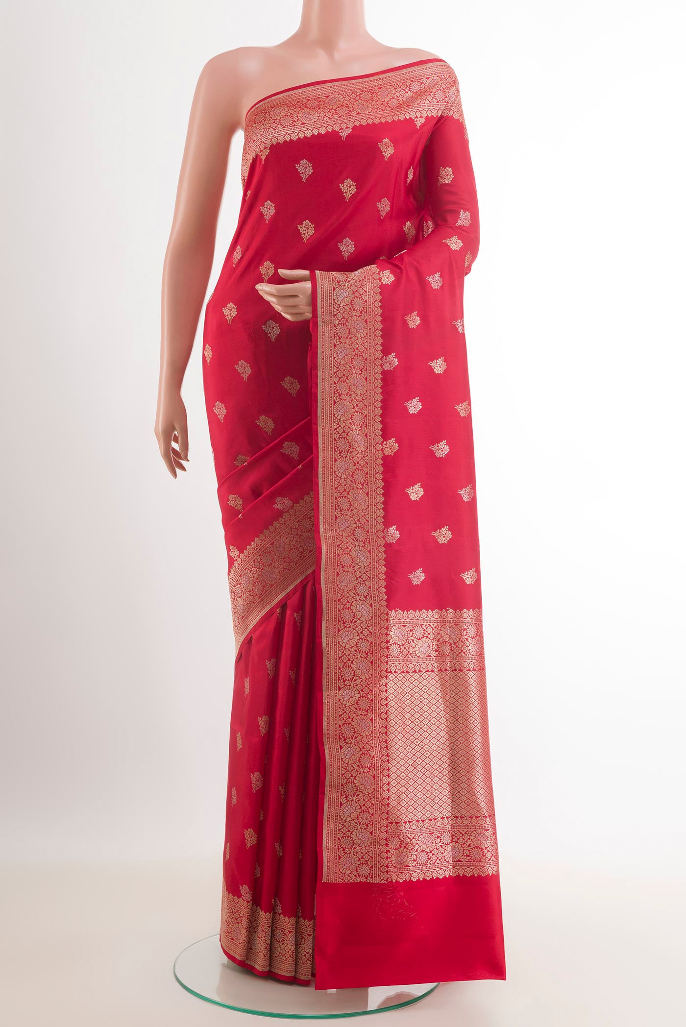 Red Banarasi Katan Silk Saree with Zari Butta on the body and Zari Border.  displayed on a mannequin