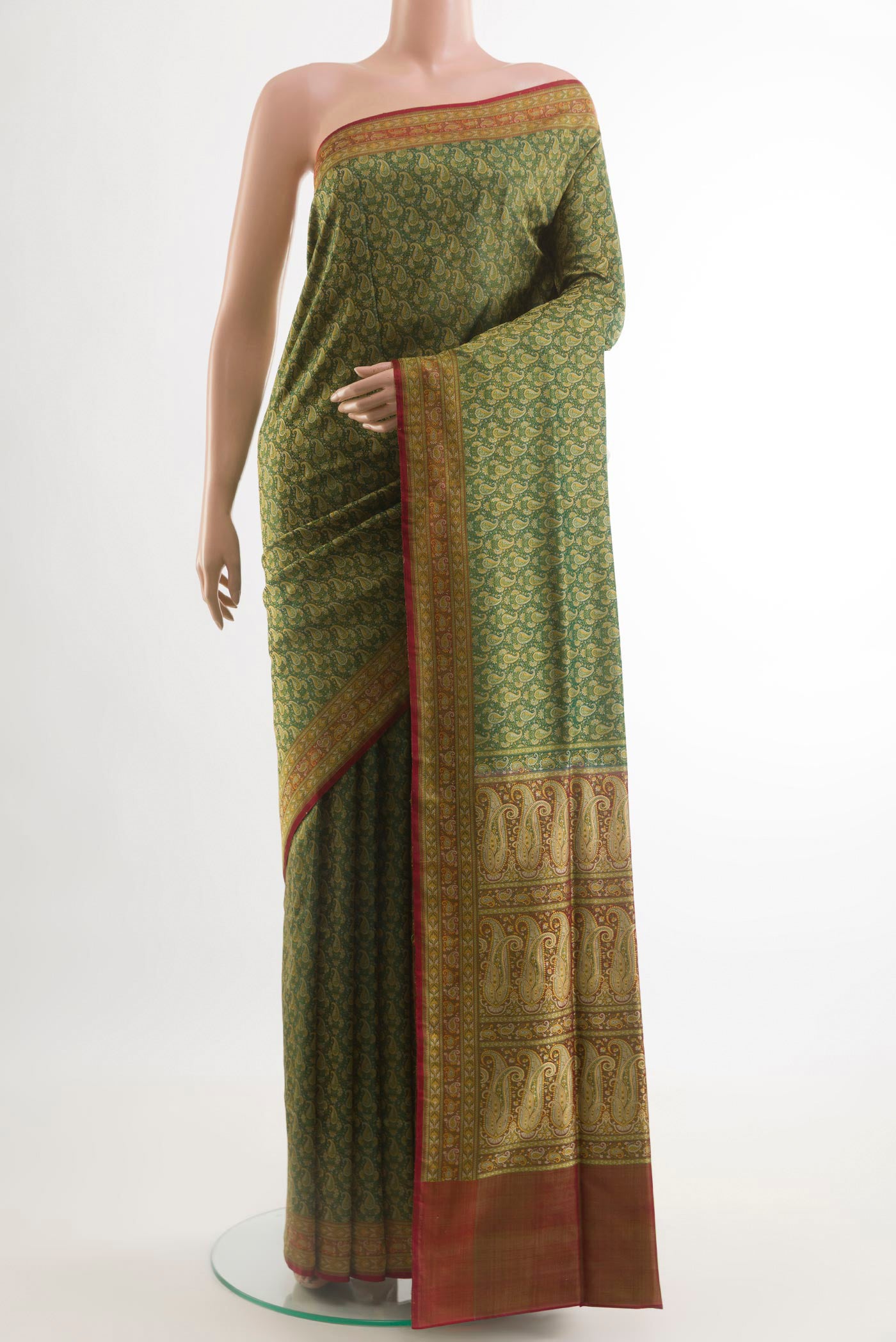 Green Banarasi Tanchoi Silk Saree with Jacquard design on the body and Thread Border.  displayed on a mannequin