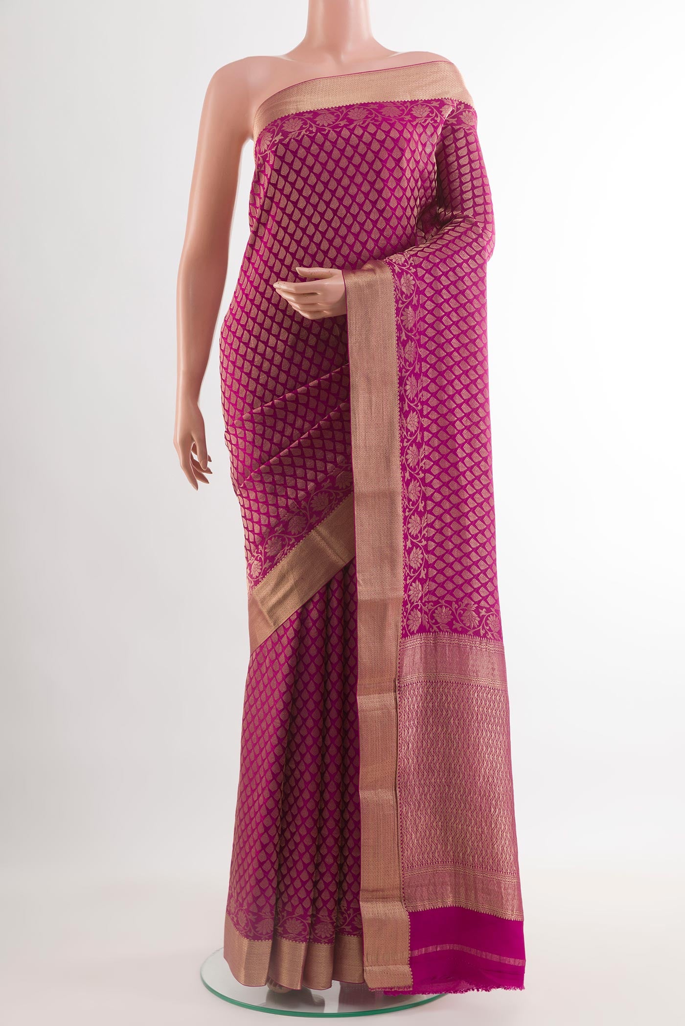 Magenta Mysore Crepe Saree with Zari Brocade on the body and Zari Border.  displayed on a mannequin