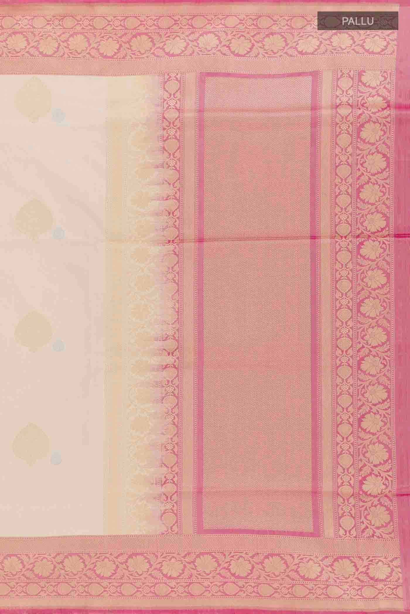 Close up image of the pallu of Off White Banarasi Silk Saree with Half And Half on the body and Zari Border