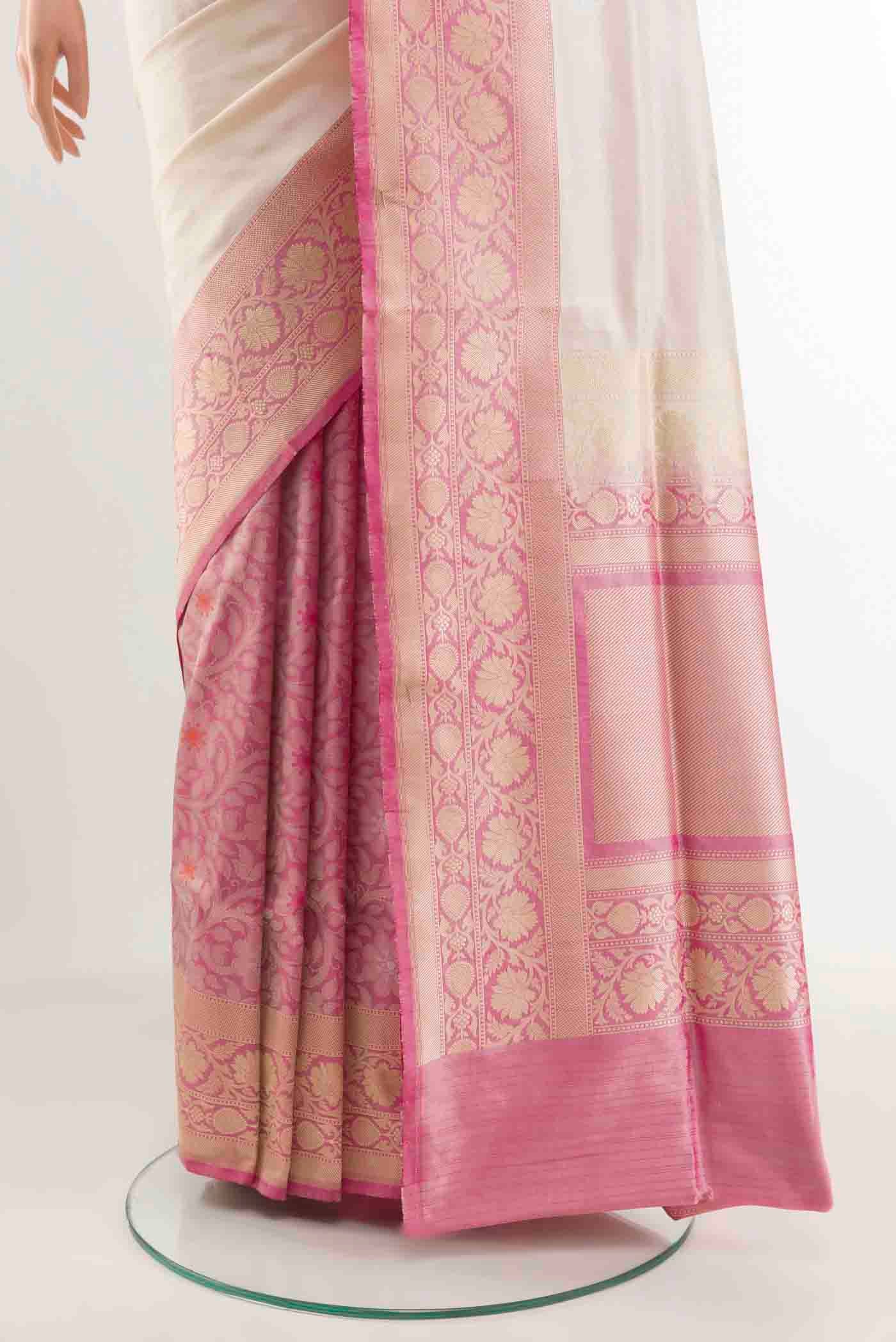 Pleats and pallu of Off White Banarasi Silk Saree with Half And Half on the body and Zari Border