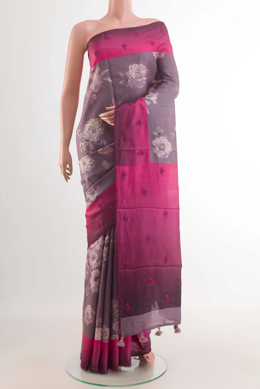 Lilac Tussar Saree with Printed design on the body and Thread Border displayed on a mannequin