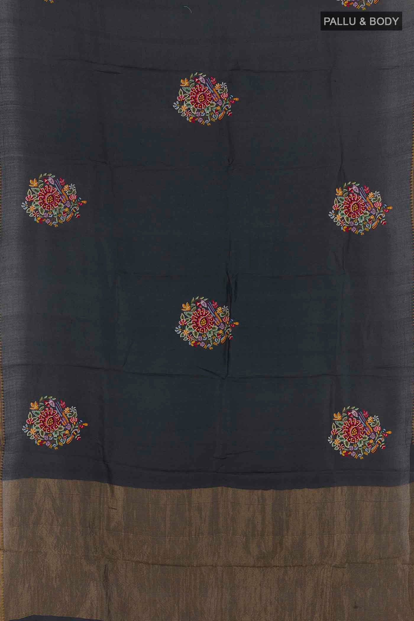Flat view of Black Tussar Saree with Thread Butta on the body and Zari Border