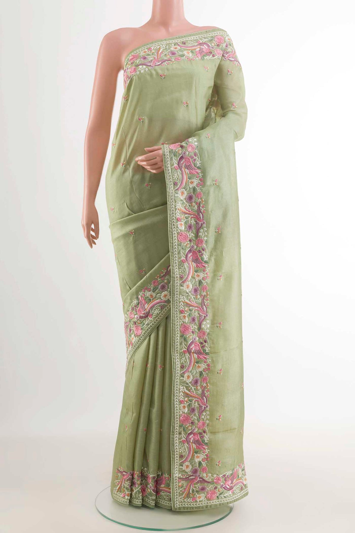Sage Green Tussar Saree with Thread Butta on the body and Embroidery Border displayed on a mannequin
