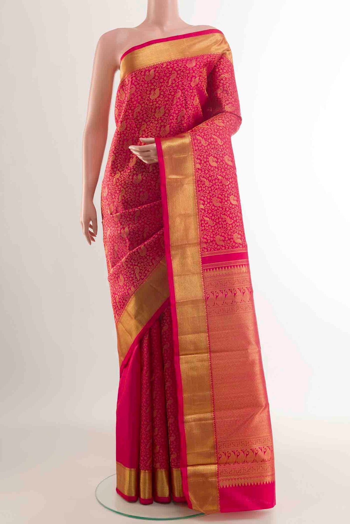 Pure Silk Pure Zari Pink Kanchipuram Saree with Zari Brocade on the body and Zari Border displayed on a mannequin