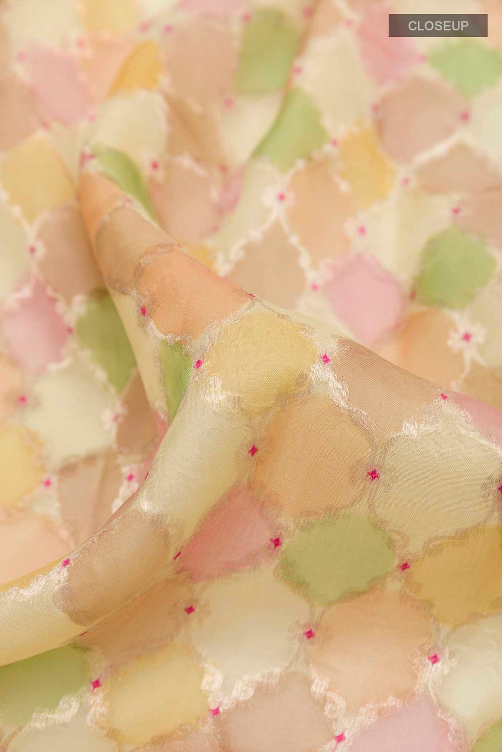 Close up of Multi Color Banarasi Kora Silk Saree with Zari Brocade on the body and Zari Border displaying folds