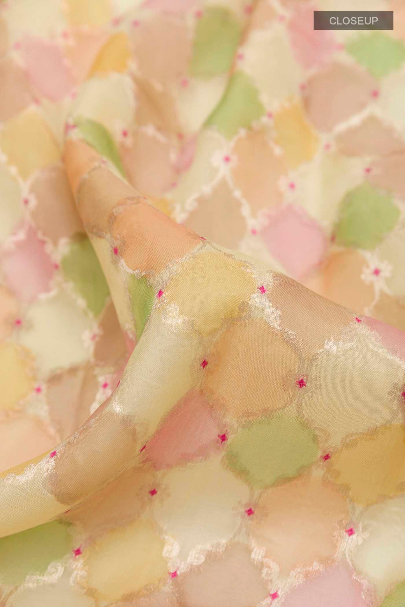 Close up of Multi Color Banarasi Kora Silk Saree with Zari Brocade on the body and Zari Border displaying folds