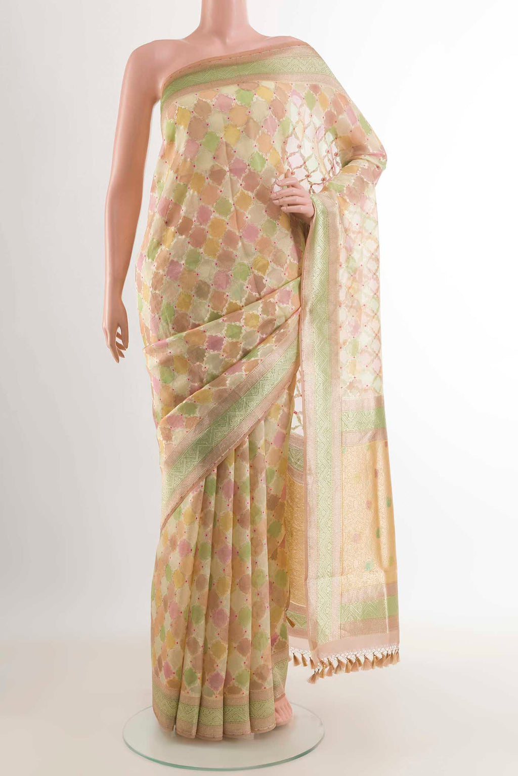 Multi Color Banarasi Kora Silk Saree with Zari Brocade on the body and Zari Border displayed on a mannequin