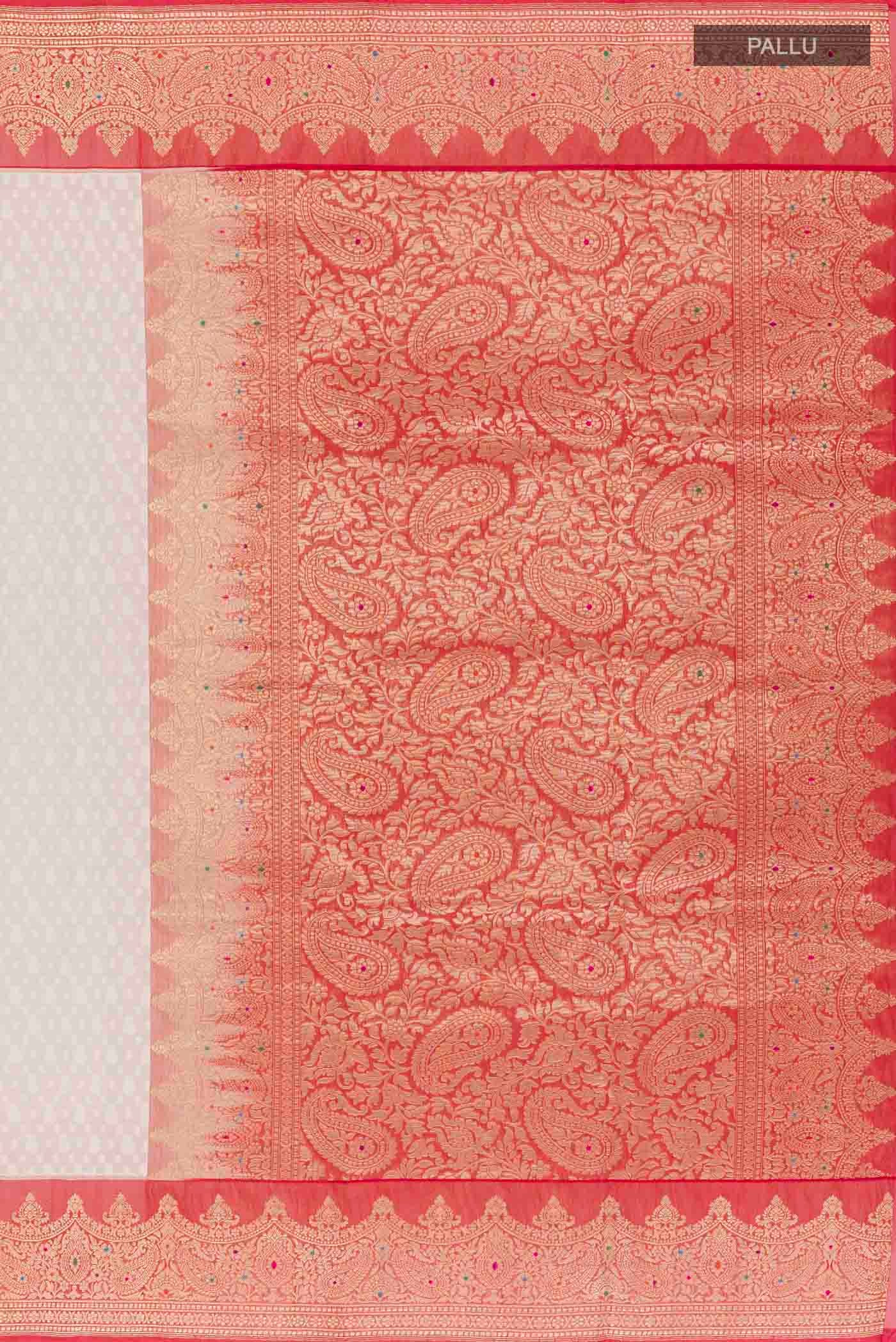 Close up image of the pallu of White Banarasi Kora Cotton Saree with Jacquard design on the body and Zari Border