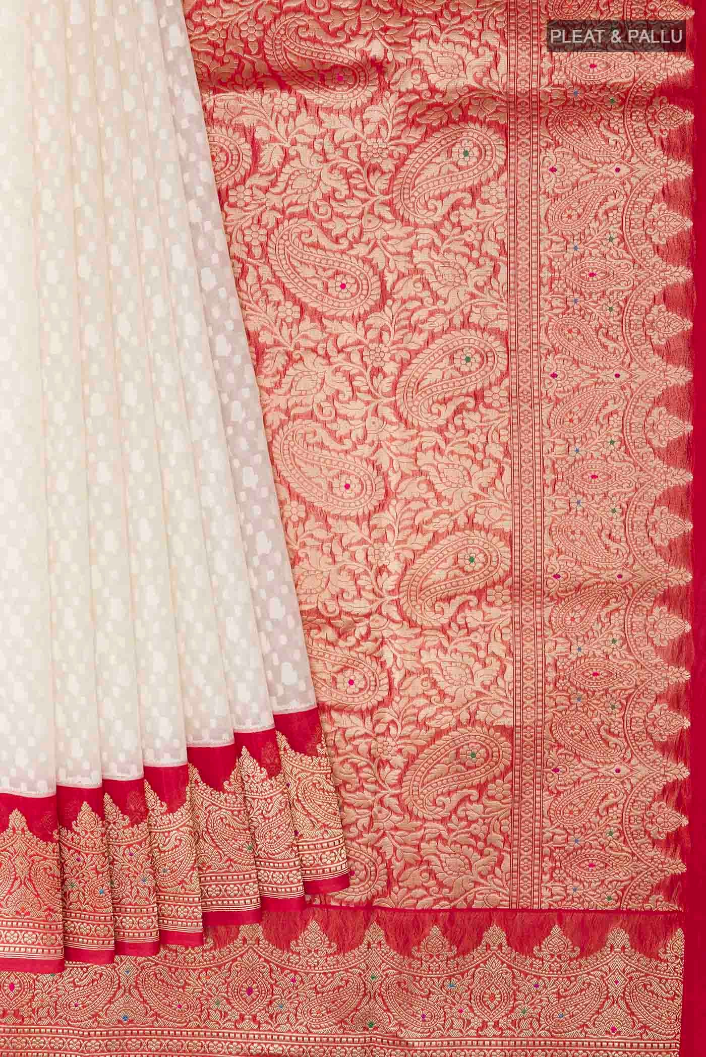 Pleats and pallu of White Banarasi Kora Cotton Saree with Jacquard design on the body and Zari Border