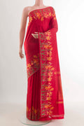 Red Pochampally Silk Saree with Plain Body and Ikat Border displayed on a mannequin