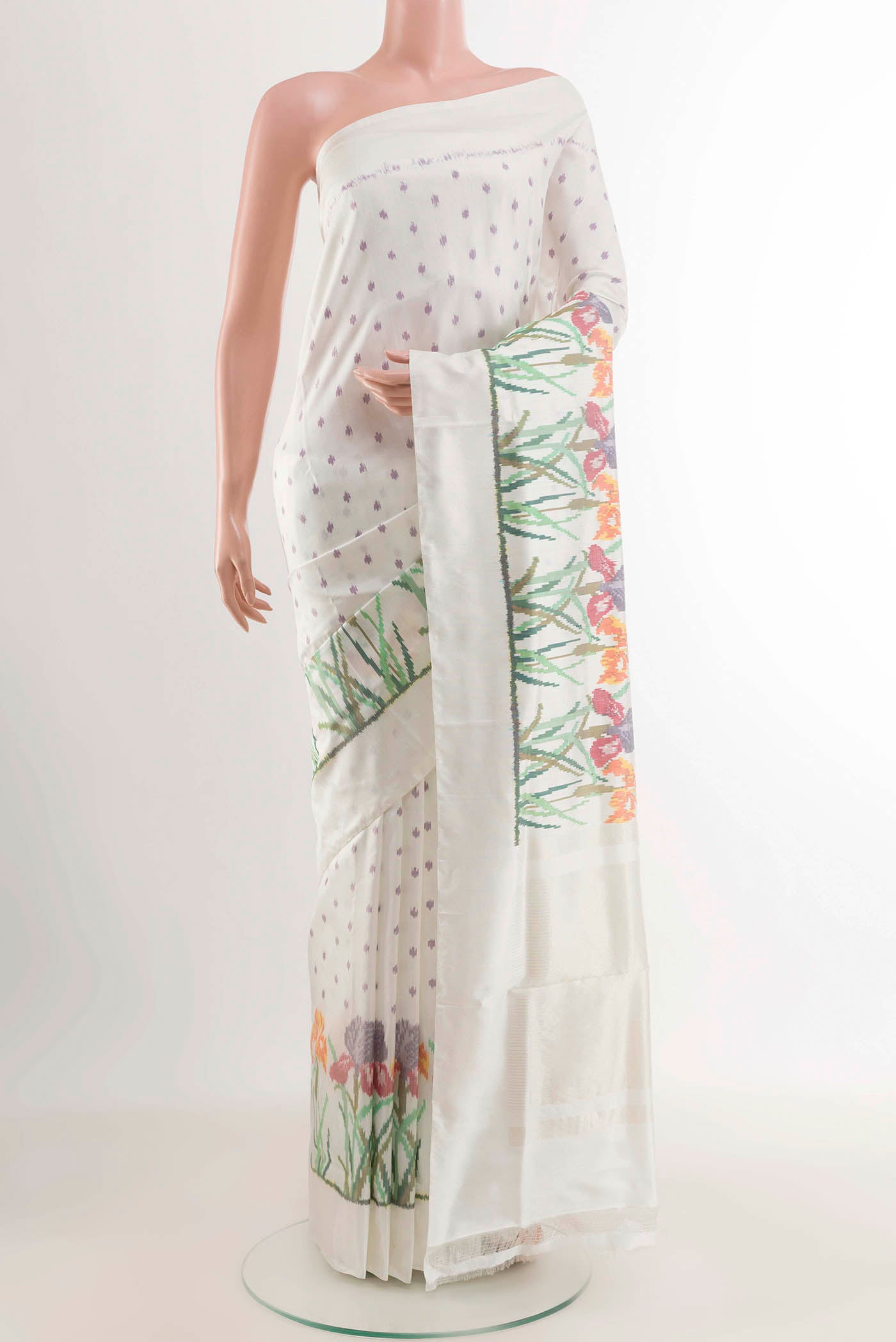 White Pochampally Silk Saree with Pure Ikat on the body and Ikat Border displayed on a mannequin