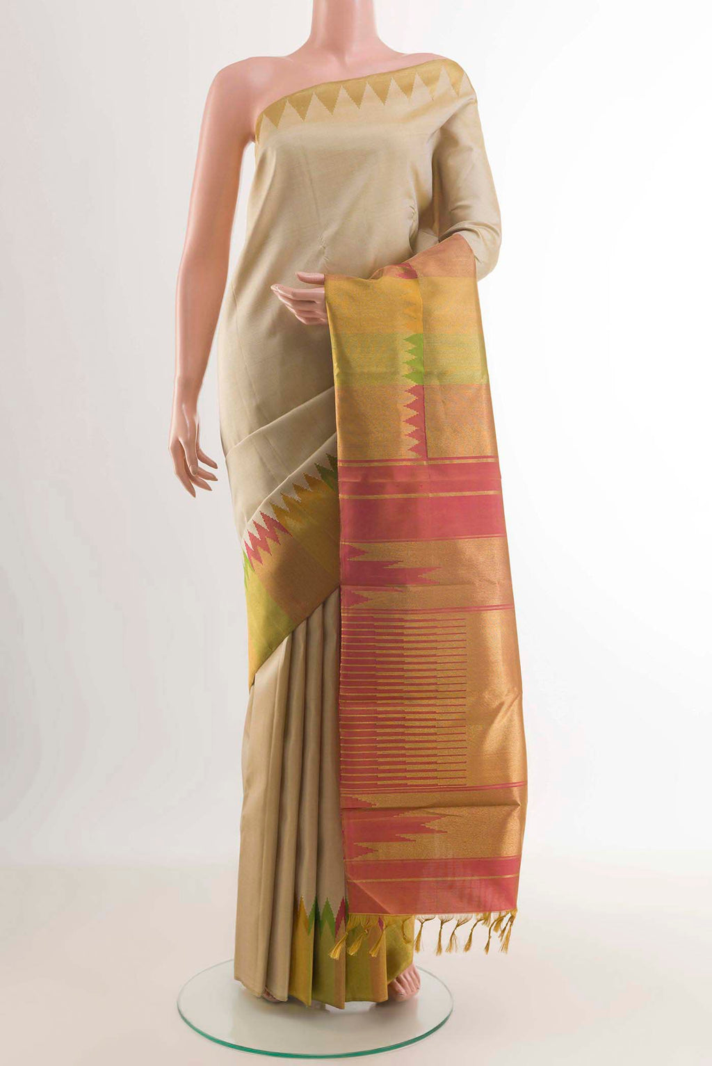 Beige Kanchipuram Silk Saree with Plain Body and Rising Temple Border displayed on a mannequin