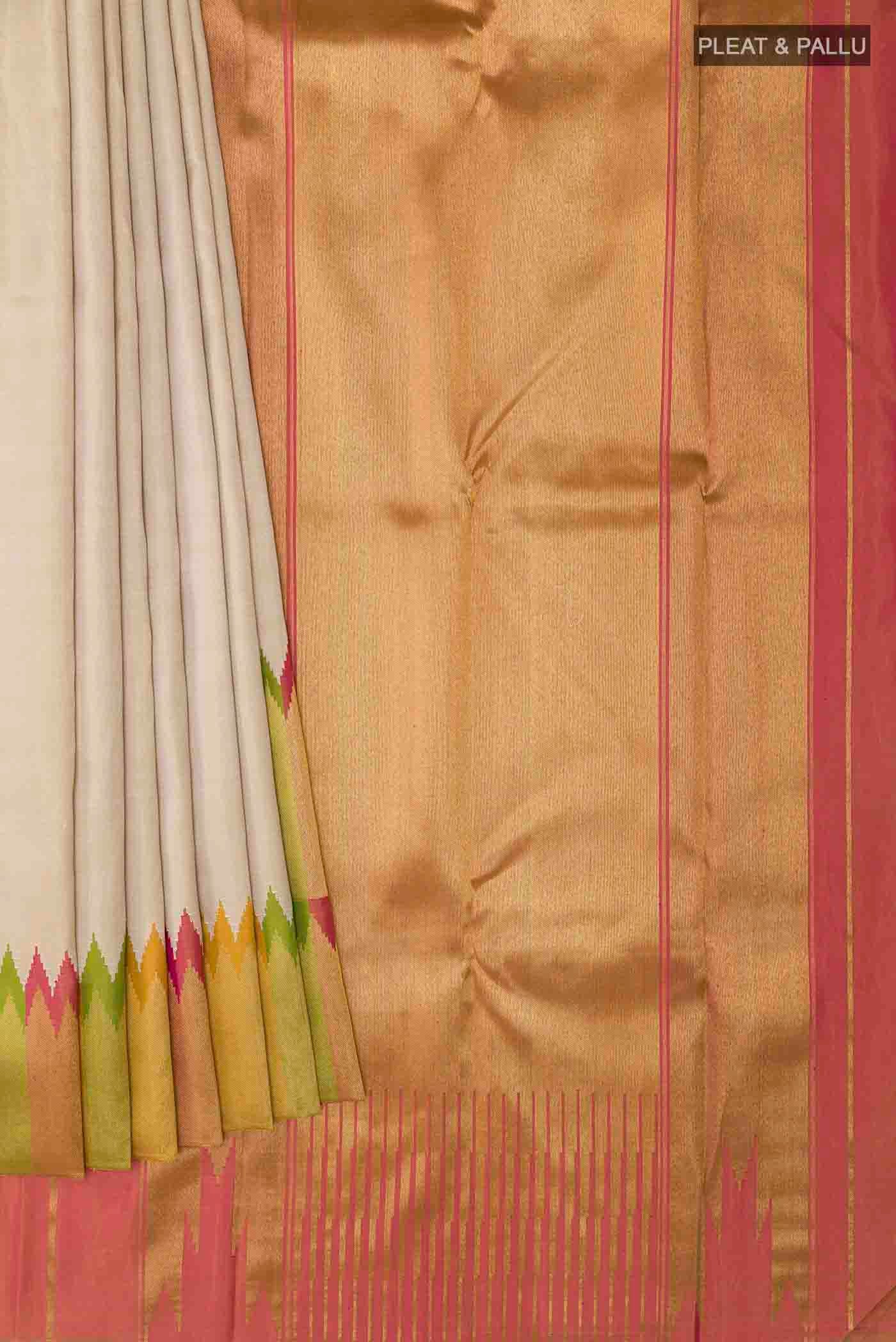 Pleats and pallu of Beige Kanchipuram Silk Saree with Plain Body and Rising Temple Border
