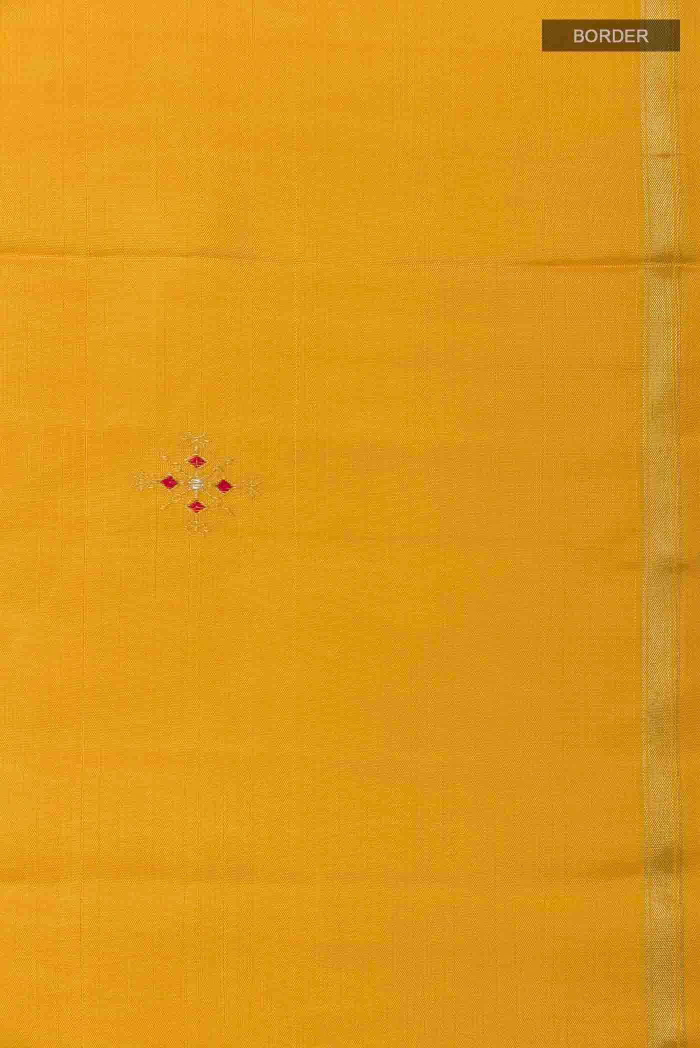 Border image of Mustard Kanchipuram Silk Saree with Zari Butta on the body and Zari Border