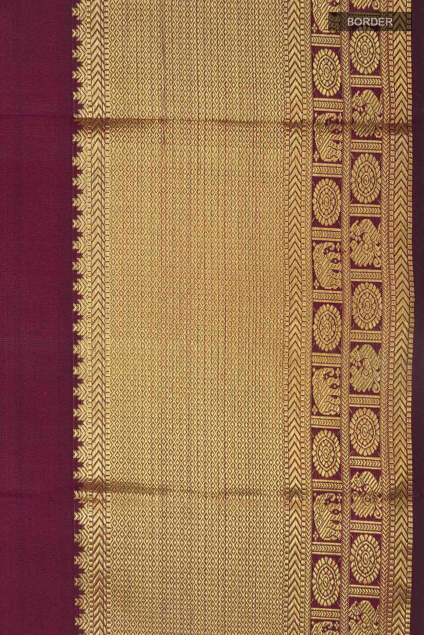 Border image of Pure Silk Pure Zari Maroon Dual Tone Kanchipuram Saree with Zari Butta on the body and Zari Border