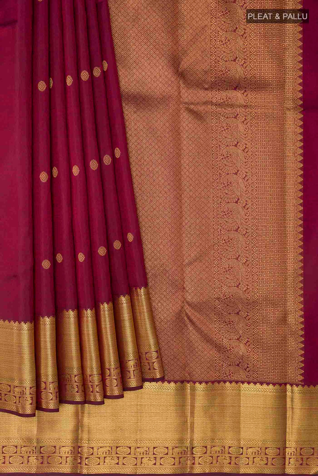 Pleats and pallu of Pure Silk Pure Zari Maroon Dual Tone Kanchipuram Saree with Zari Butta on the body and Zari Border