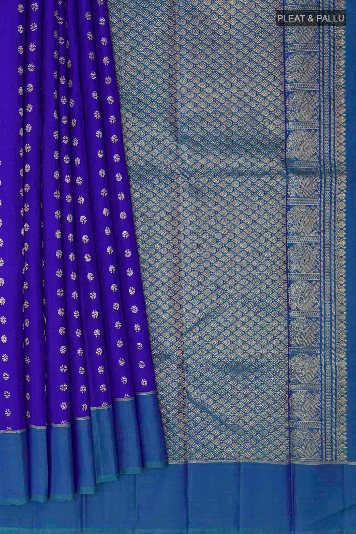 Pleats and pallu of Blue Kanchipuram Silk Saree with Zari Butta on the body and Zari Border