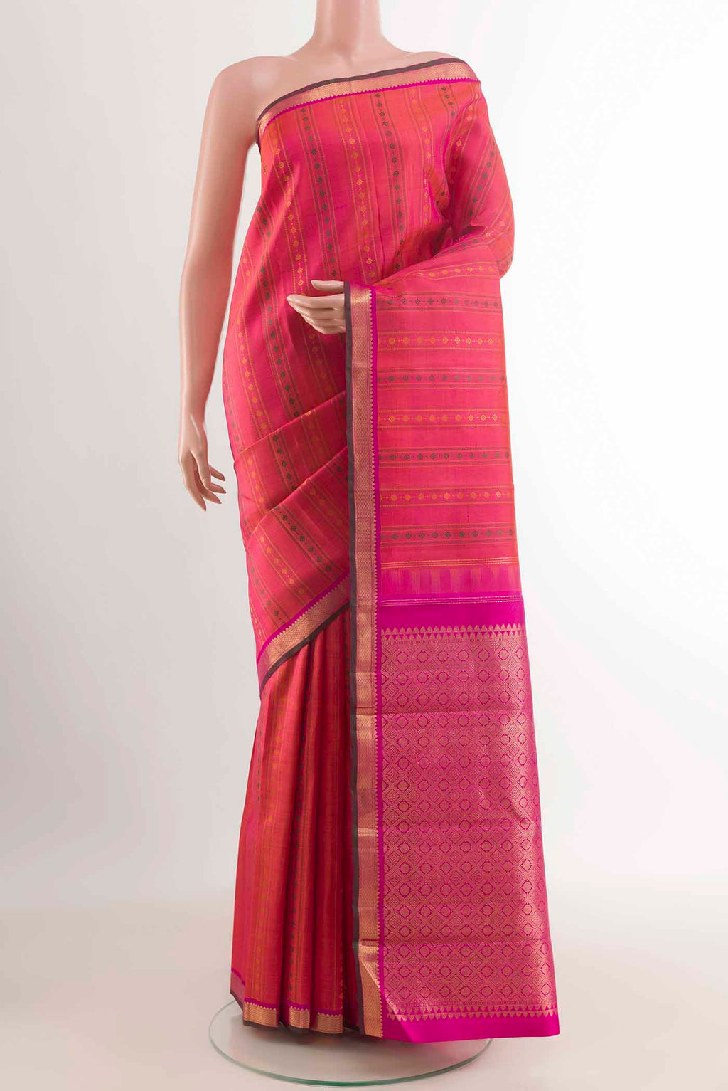 Pink with Orange Color Kanchipuram Silk Saree with Stripes on the body and Zari Border displayed on a mannequin