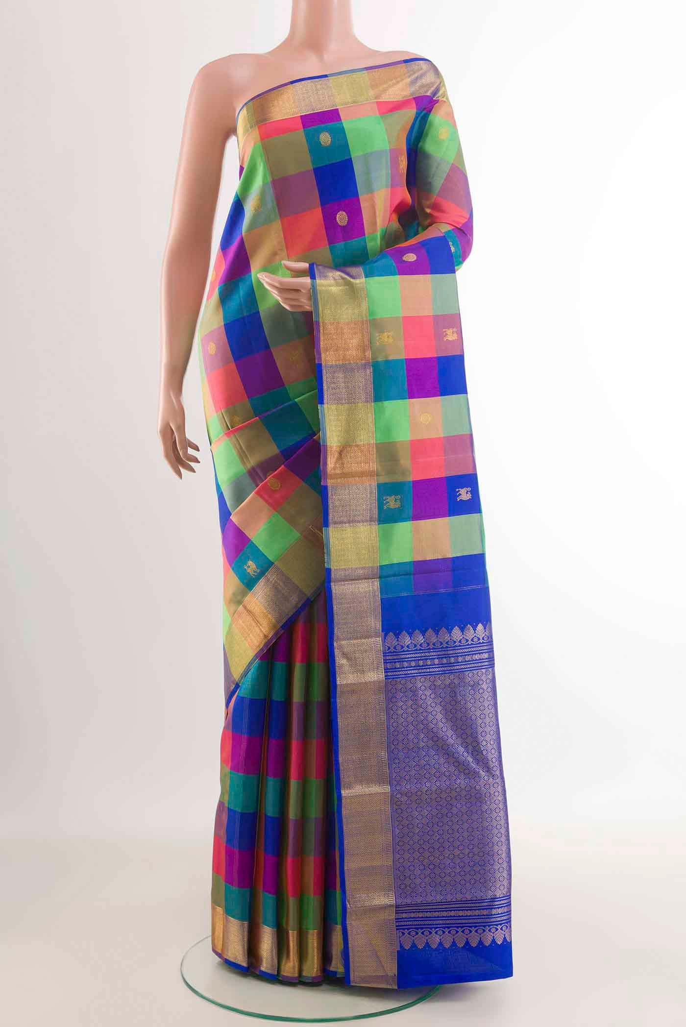 Multi Color Kanchipuram Silk Saree with Checked design on the body and Zari Border displayed on a mannequin
