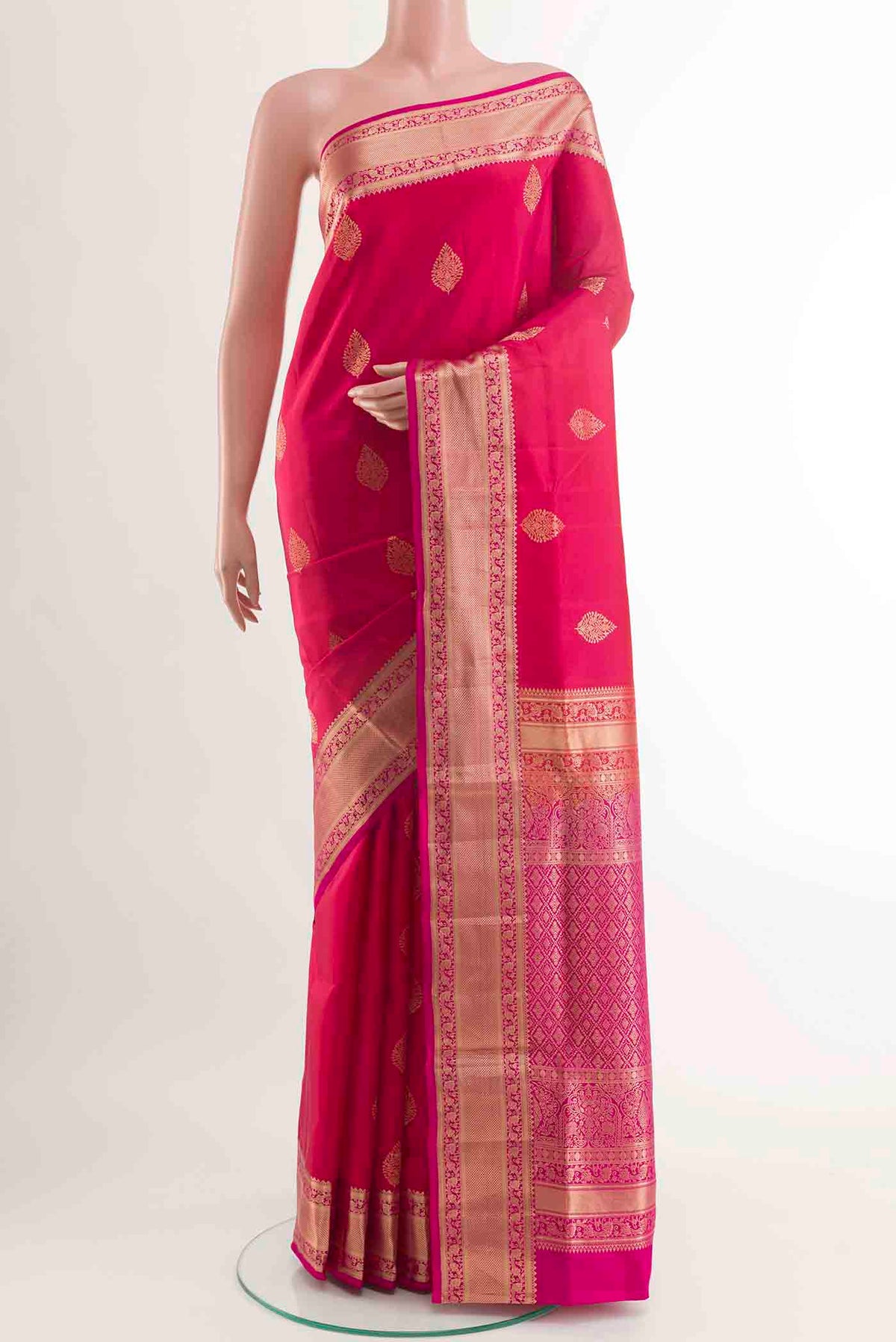 Red Soft Silk Saree with Zari Butta on the body and Zari Border displayed on a mannequin