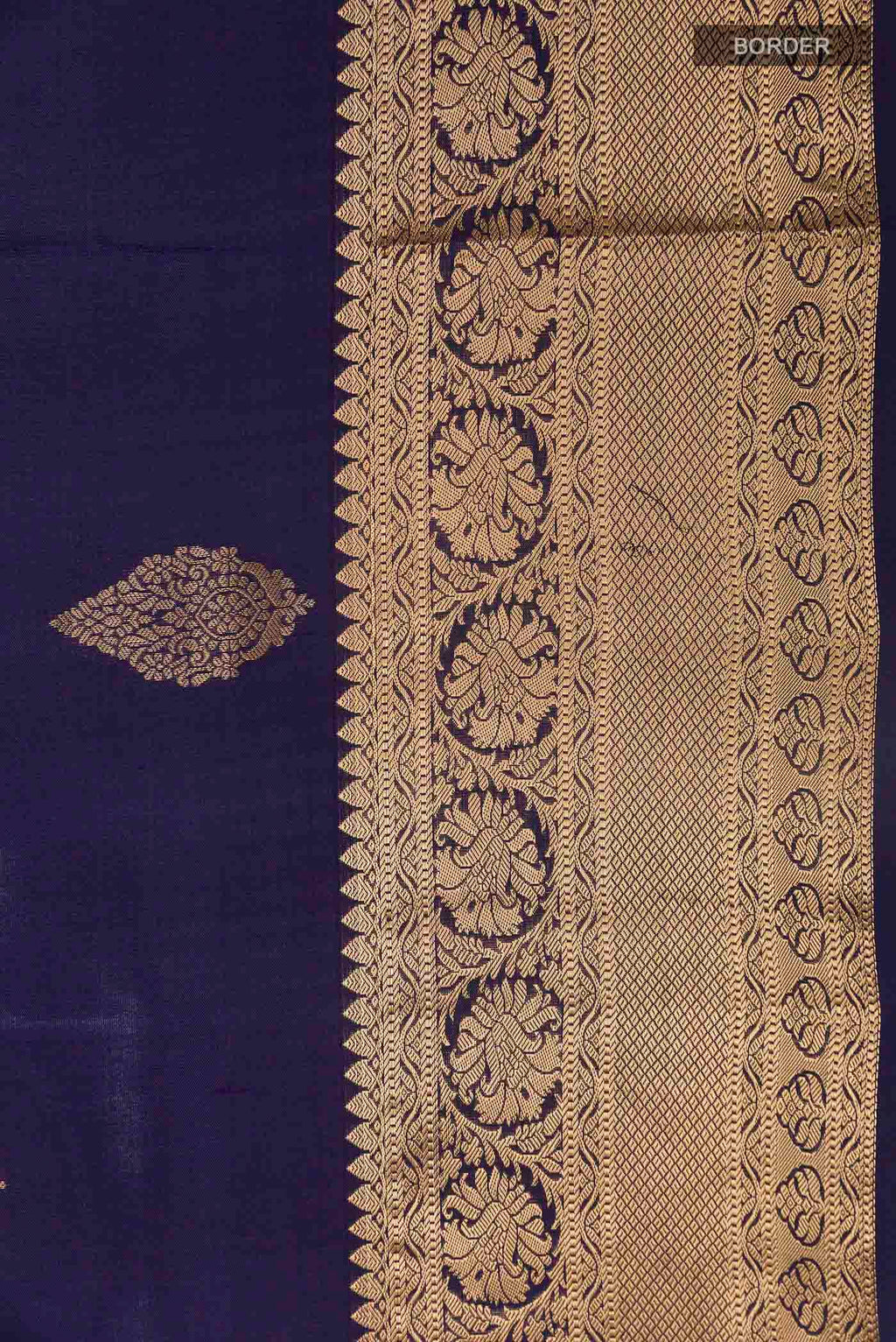 Border image of Navy Blue Soft Silk Saree with Zari Butta on the body and Zari Border