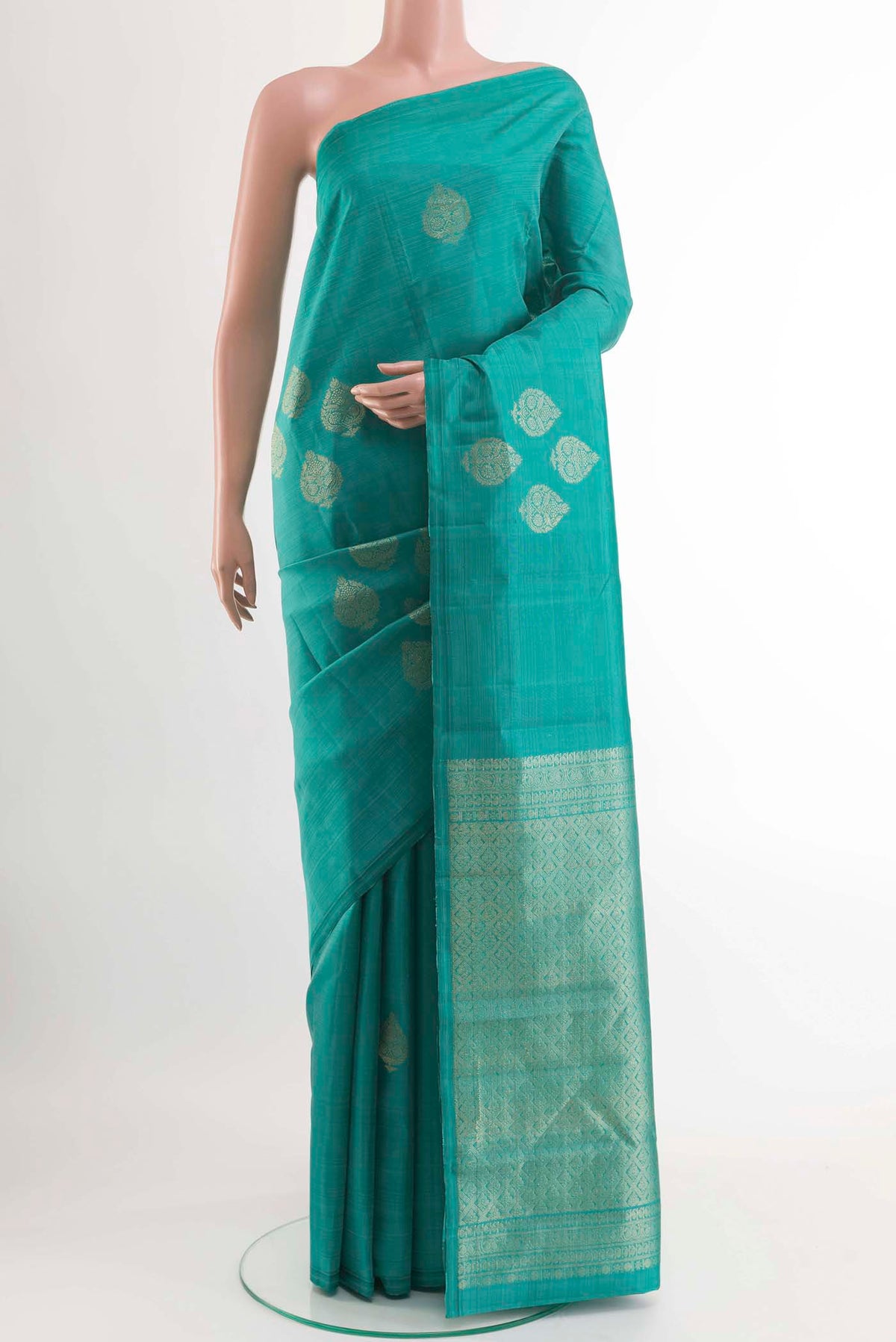 Sea Green Kanchipuram Silk Saree with Zari Butta on the body and Zari Border displayed on a mannequin